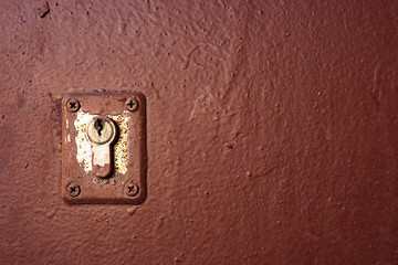 Hole of the door lock on the wooden door