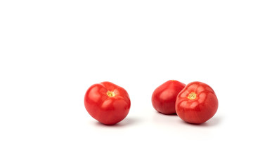 Still life, juicy, red, ripe tomatoes,on a white background