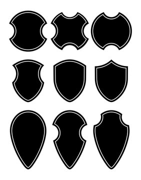 Shield silhouettes for signs and symbols (safety, security, military, medieval). Vector illustration.