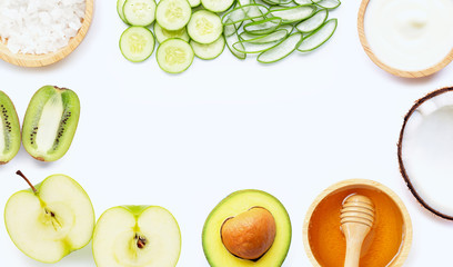 Natural ingredients for homemade skin care on white