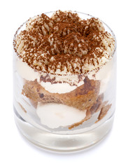 Classic tiramisu dessert in a glass isolated on a white background with clipping path