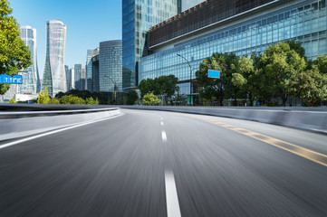 Empty road floor surface with modern city landmark buildings of hangzhou bund Skyline,zhejiang,china
