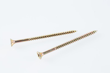 Screws still life large self tapping screws on white background.