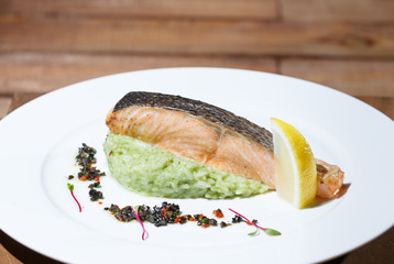 Fish steak with lemon.