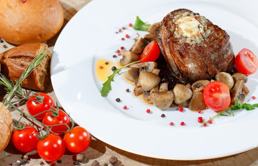 Meat dish with mushrooms.