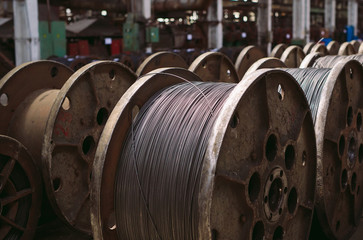 Wire rod, fittings in warehouses. industrial storehouse at the metallurgical plant.