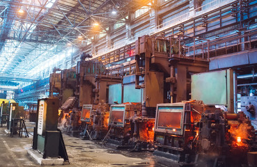 hot steel on conveyor in steel mill