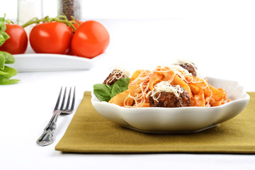 closeup of spaghetti and meatballs in a bowl
