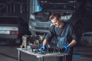 Master collects a rebuilt motor for the car..