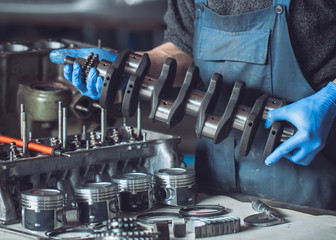 Master collects a rebuilt motor for the car..
