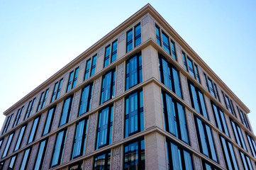 blue glass wall of modern office building downtown St. Petersburg