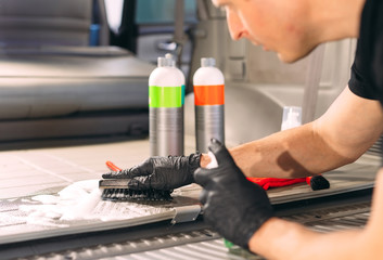 Car chemist. Chemical treatment of the car trunk.