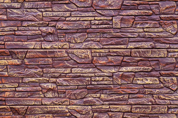 The texture of the stones covered with brown lacquer, can be used as a background