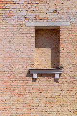 The texture of red bricks and window, can be used as a background