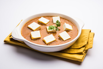 Paneer butter masala or Panir makhanwala, served in a bowl. selective focus