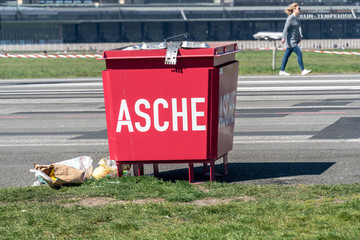 Ash (German: Asche) container at Berlin Tempelhof field urban park. The former airport with its...