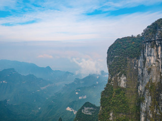 Fototapeta na wymiar beautiful view with Balcony cliff walk on Tianmen mountain with clear Sky in zhangjiajie city China.Tianmen mountain the travel destination of Hunan zhangjiajie city China