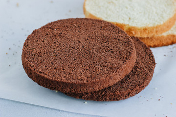 Fototapeta na wymiar Sponge cake of chocolate on the table
