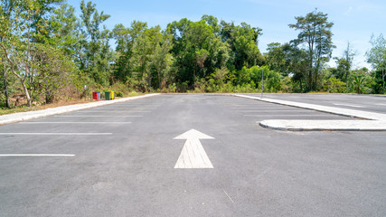 Arrow symbol sign in Parking ,parking lot, parking lane outdoor with blue sky background