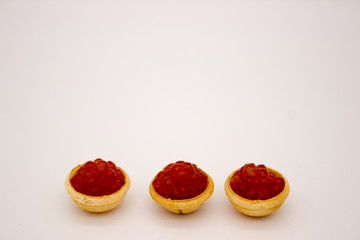 Luxury Red Caviar in the bowl. Food photo concept.