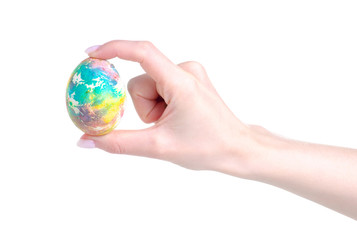 Painted egg in hand on white background. Isolation
