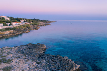 Aerial coastline sunset over mediterranean sea. Purple sky. blue water - 264981678