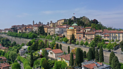 Fototapeta na wymiar Aerial drone photo of iconic and beautiful old fortified upper Medieval city of Bergamo, Lombardy, Italy