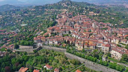 Aerial drone photo of iconic and beautiful old fortified upper Medieval city of Bergamo, Lombardy, Italy