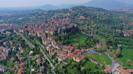 Aerial drone photo of iconic and beautiful old fortified upper Medieval city of Bergamo, Lombardy, Italy