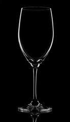 Empty wineglass on black background