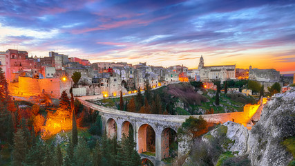 Gravina in Puglia ancient town, bridge and canyon at sunrise