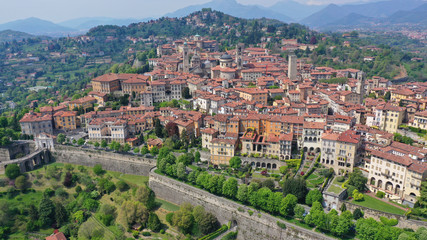 Aerial drone photo of iconic and beautiful old fortified upper Medieval city of Bergamo, Lombardy, Italy