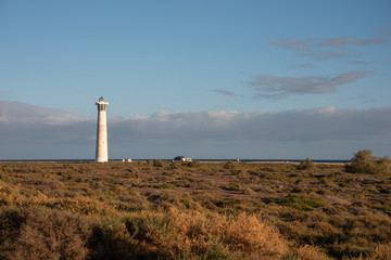 Obraz premium Morro Jable lighthouse during sunset. Fuerteventura, Canary Islands, Spain. 
