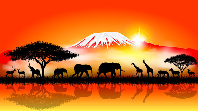 Savannah animals on the background of mount Kilimanjaro