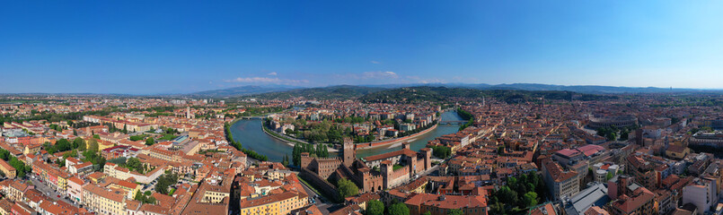 Fototapeta na wymiar Aerial drone photo from iconic fortified medieval castle and bridge of Castelvecchio used as a museum, Verona, Italy