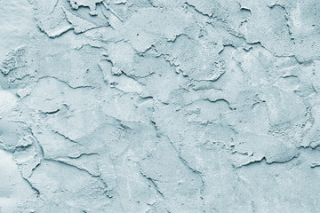 Grunge blue painted rough textured wall