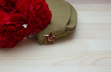 Victory day composition with clove and flight cap with free space