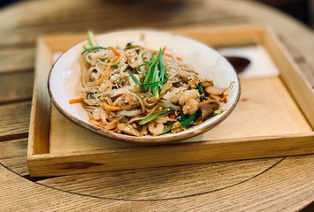 Noodles with shrimp and vegetables. Asian dish.