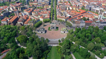 Fototapeta na wymiar Aerial drone photo of iconic Arch of Peace or Arco della Pace in beautiful Sempione park in the heart of Milan, Lombardy, Italy