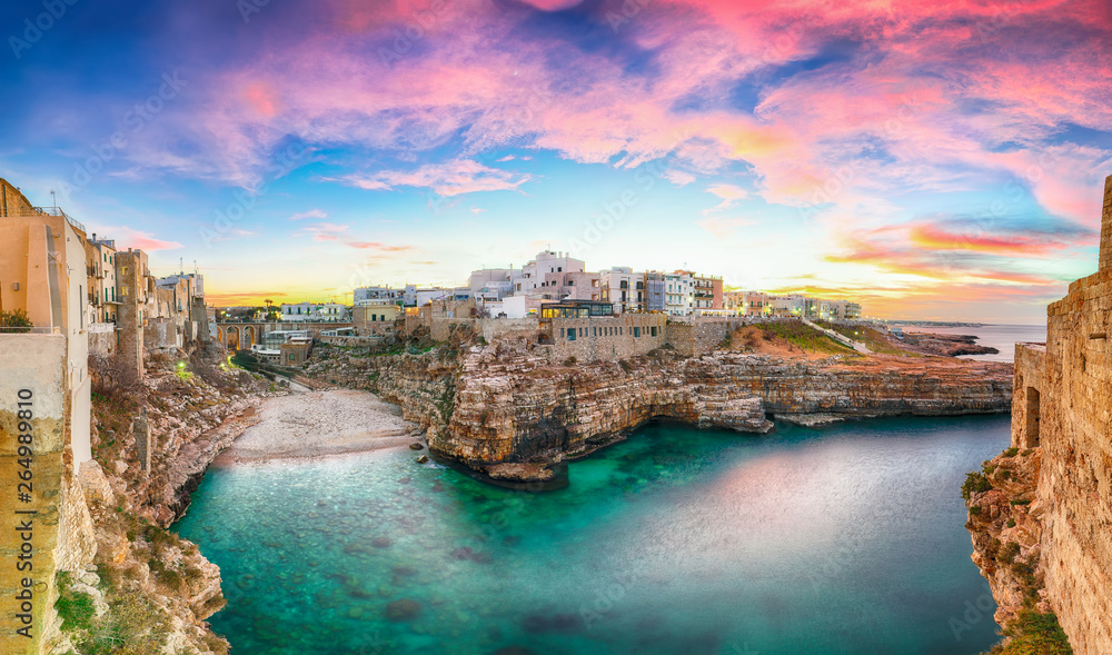 Poster Sunset at Cala Paura gulf