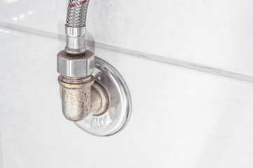 Plumbing plumbing in the bathroom of hot and cold water