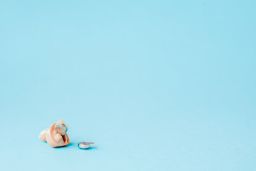 Obraz na płótnie Canvas Hearing aid on blue background. Medical, pharmacy and healthcare concept. Copy space. Empty place for text or logo
