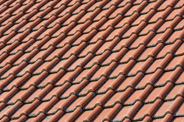 Close up view of red ceramic rooftop, roof cover on housetop