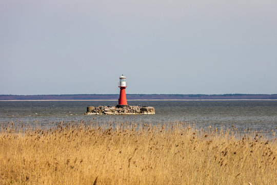 In Lithuania, Pervalka lighthouse stands in the middle of the sea