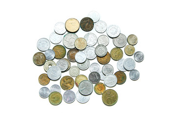 Old, invalid coins from different european countries isolated on a white background. 