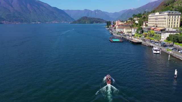 Aerial drone video of iconic village of Tremezzina in lake Como one of the most beautiful and deepest in Europe, Lombardy, Italy