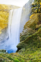 View of Skogafoss waterfall in winter in Iceland.