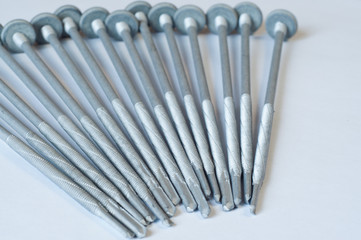 Screws macro photo. Screws for sandwich panels.