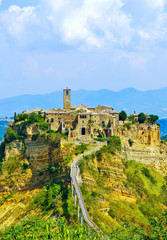 Fototapeta premium View of Civita village located on a hill and connected with Bagnoregio town by a bridge in central Italy.
