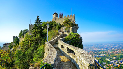 View of the Guaita fortress located on the peak of Monte Titano in San Marino.  - obrazy, fototapety, plakaty